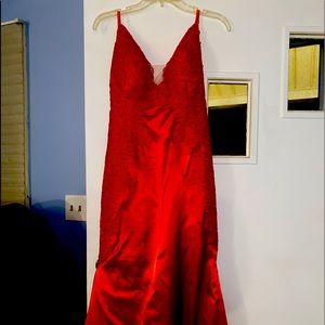 red silk prom dress. It is a size 4/6 with train